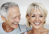 Happy dental implants couple in Derry, NH