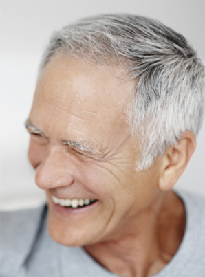 Smiling man with healthy teeth from teeth cleaning in Derry, NH
